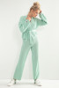 Elegant 3-piece summer set made of merino wool pants, top, and short cardigan with a belt F1191 green